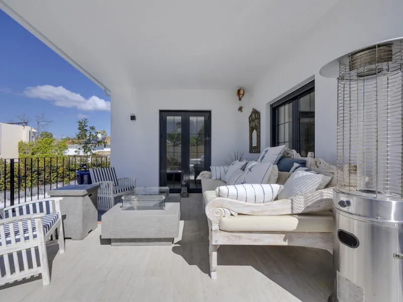 Discover this exceptional southwest-facing villa, a stunning blend of contemporary elegance and modern comfort. Recently refurbished with top-quality materials, this exquisite home boasts a sleek design that perfectly complements its surroundings. Located