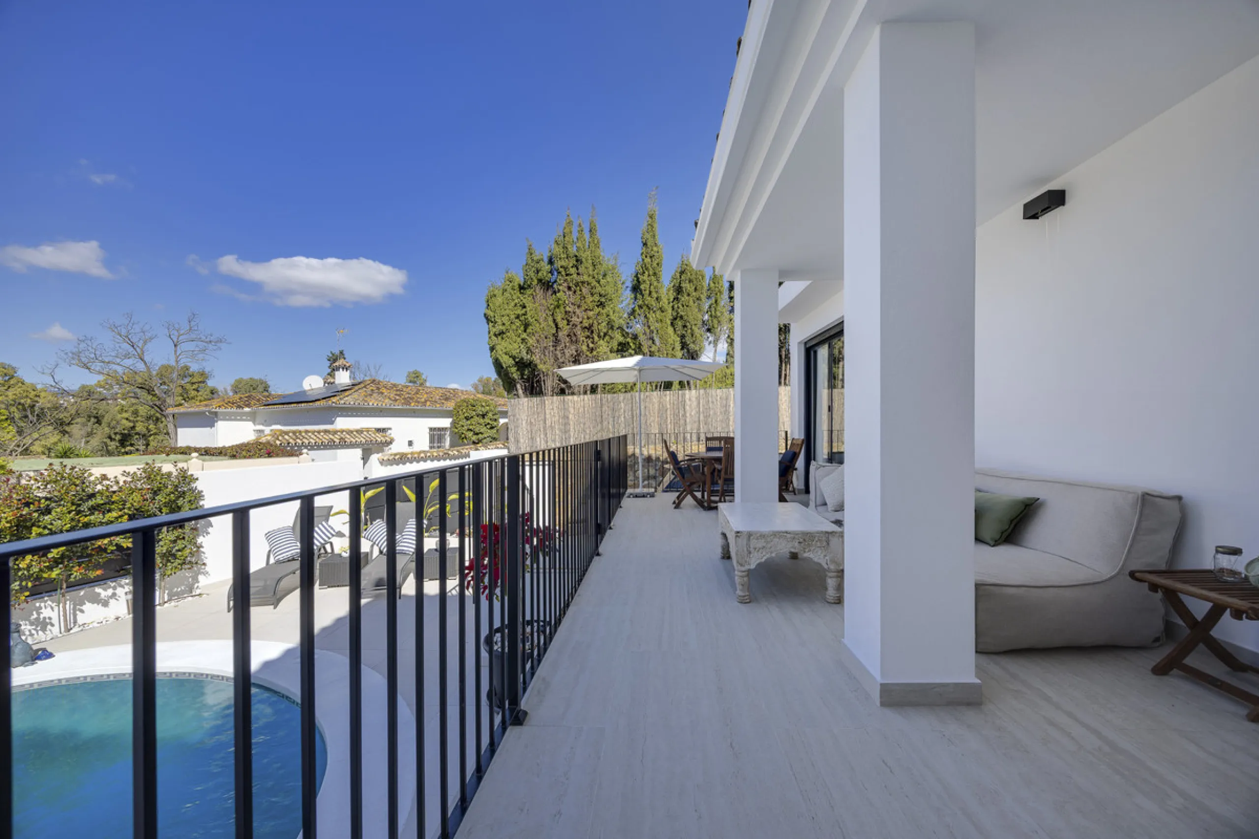 Discover this exceptional southwest-facing villa, a stunning blend of contemporary elegance and modern comfort. Recently refurbished with top-quality materials, this exquisite home boasts a sleek design that perfectly complements its surroundings. Located