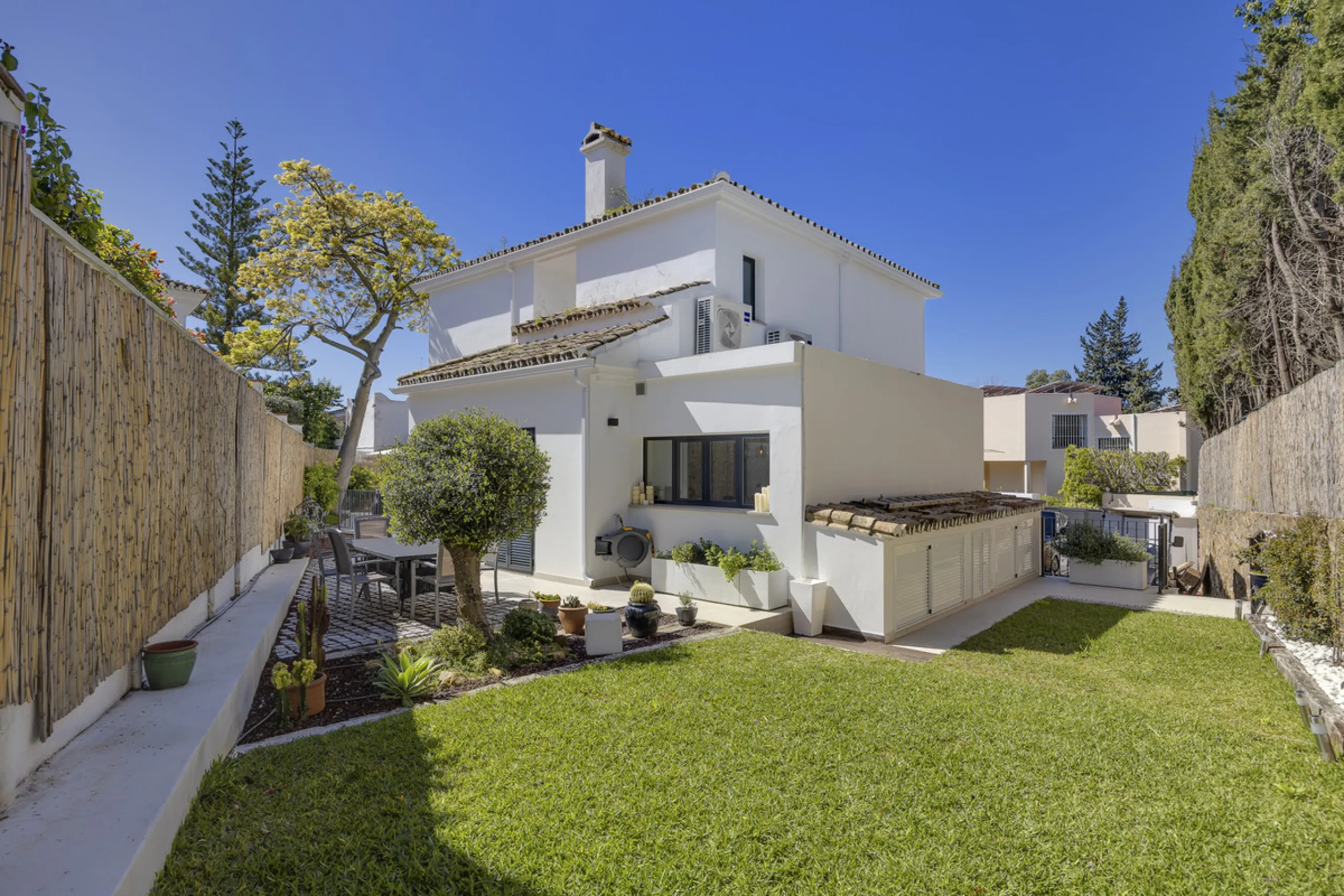 Discover this exceptional southwest-facing villa, a stunning blend of contemporary elegance and modern comfort. Recently refurbished with top-quality materials, this exquisite home boasts a sleek design that perfectly complements its surroundings. Located