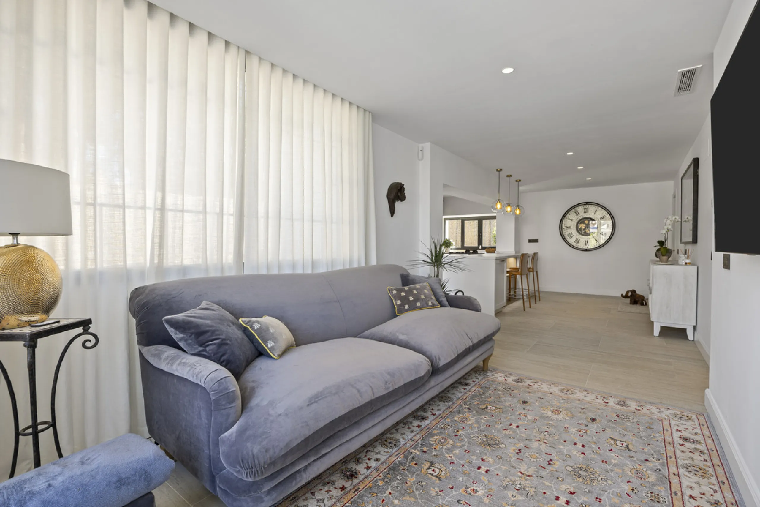 Discover this exceptional southwest-facing villa, a stunning blend of contemporary elegance and modern comfort. Recently refurbished with top-quality materials, this exquisite home boasts a sleek design that perfectly complements its surroundings. Located