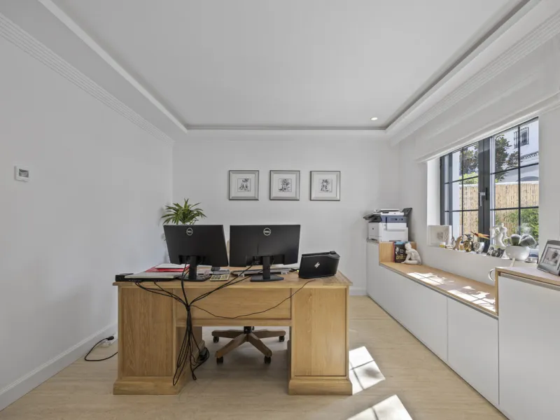 Discover this exceptional southwest-facing villa, a stunning blend of contemporary elegance and modern comfort. Recently refurbished with top-quality materials, this exquisite home boasts a sleek design that perfectly complements its surroundings. Located