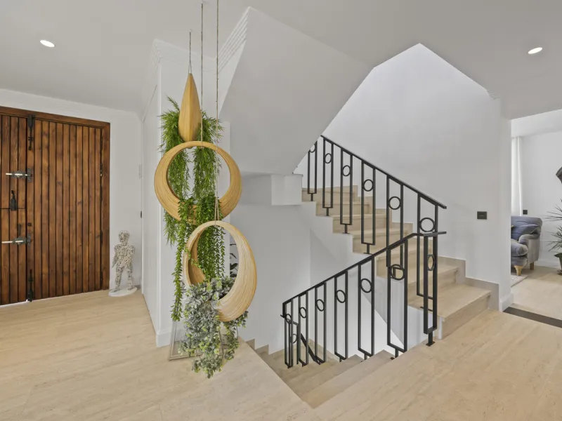 Discover this exceptional southwest-facing villa, a stunning blend of contemporary elegance and modern comfort. Recently refurbished with top-quality materials, this exquisite home boasts a sleek design that perfectly complements its surroundings. Located