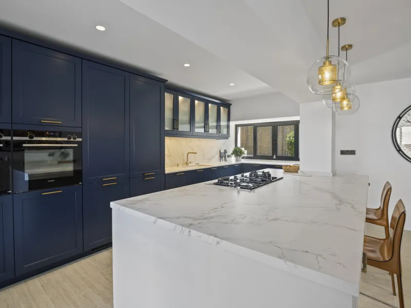 Discover this exceptional southwest-facing villa, a stunning blend of contemporary elegance and modern comfort. Recently refurbished with top-quality materials, this exquisite home boasts a sleek design that perfectly complements its surroundings. Located