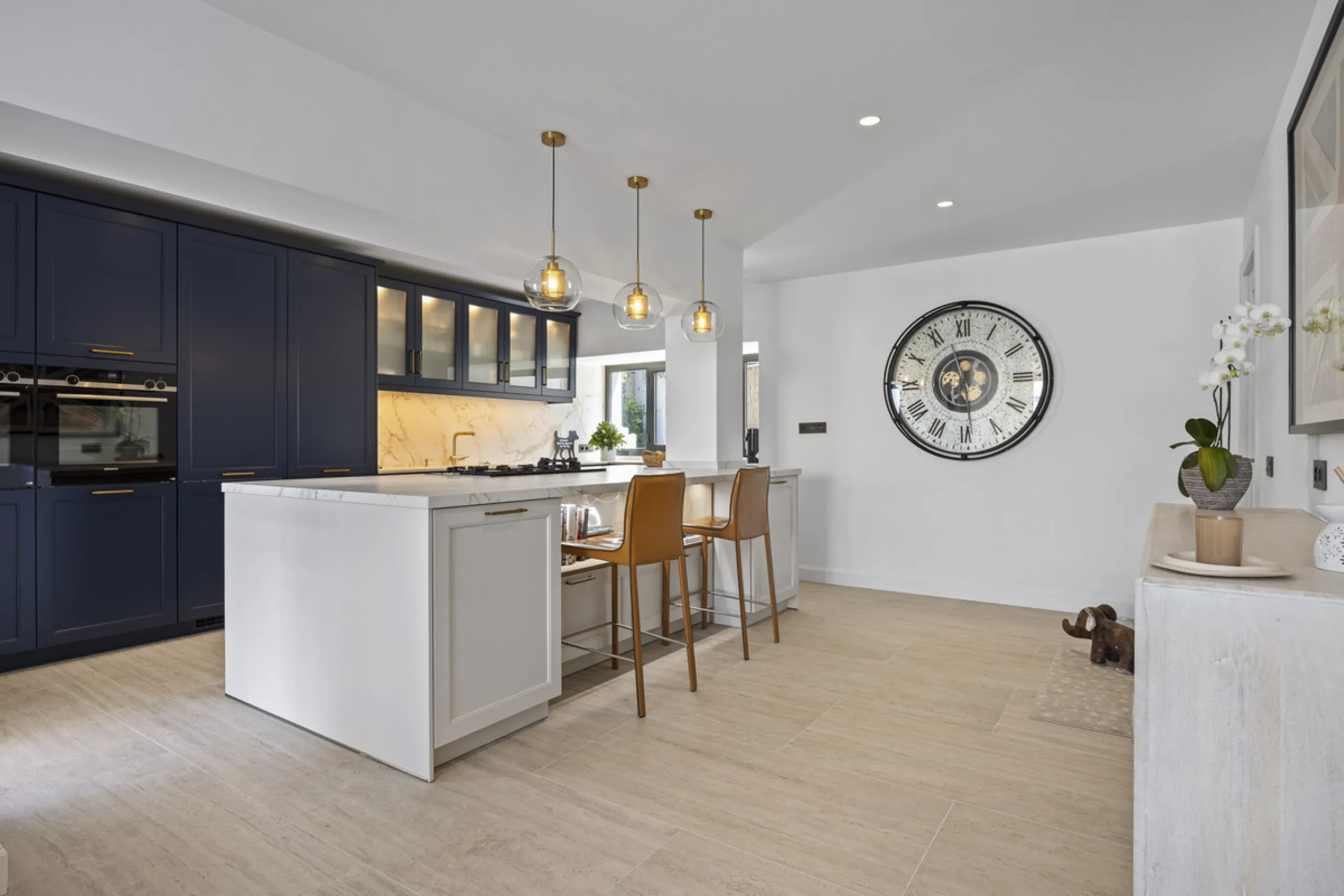 Discover this exceptional southwest-facing villa, a stunning blend of contemporary elegance and modern comfort. Recently refurbished with top-quality materials, this exquisite home boasts a sleek design that perfectly complements its surroundings. Located