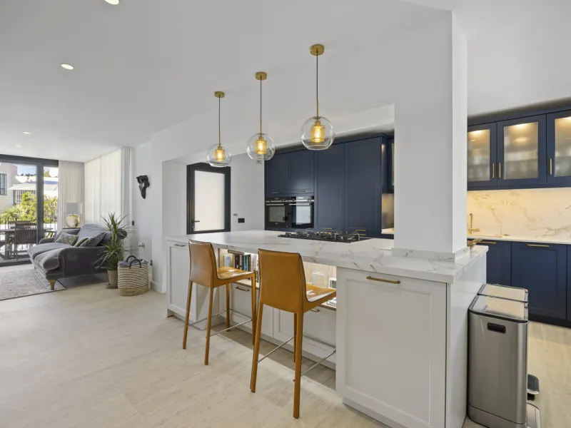 Discover this exceptional southwest-facing villa, a stunning blend of contemporary elegance and modern comfort. Recently refurbished with top-quality materials, this exquisite home boasts a sleek design that perfectly complements its surroundings. Located