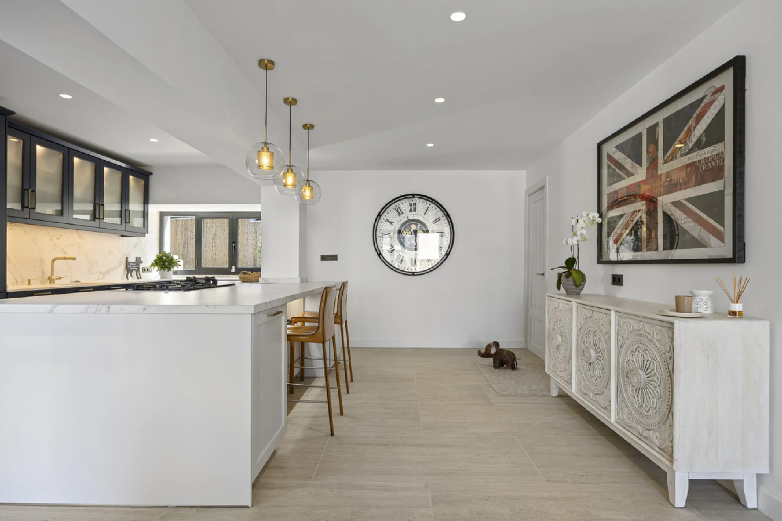 Discover this exceptional southwest-facing villa, a stunning blend of contemporary elegance and modern comfort. Recently refurbished with top-quality materials, this exquisite home boasts a sleek design that perfectly complements its surroundings. Located