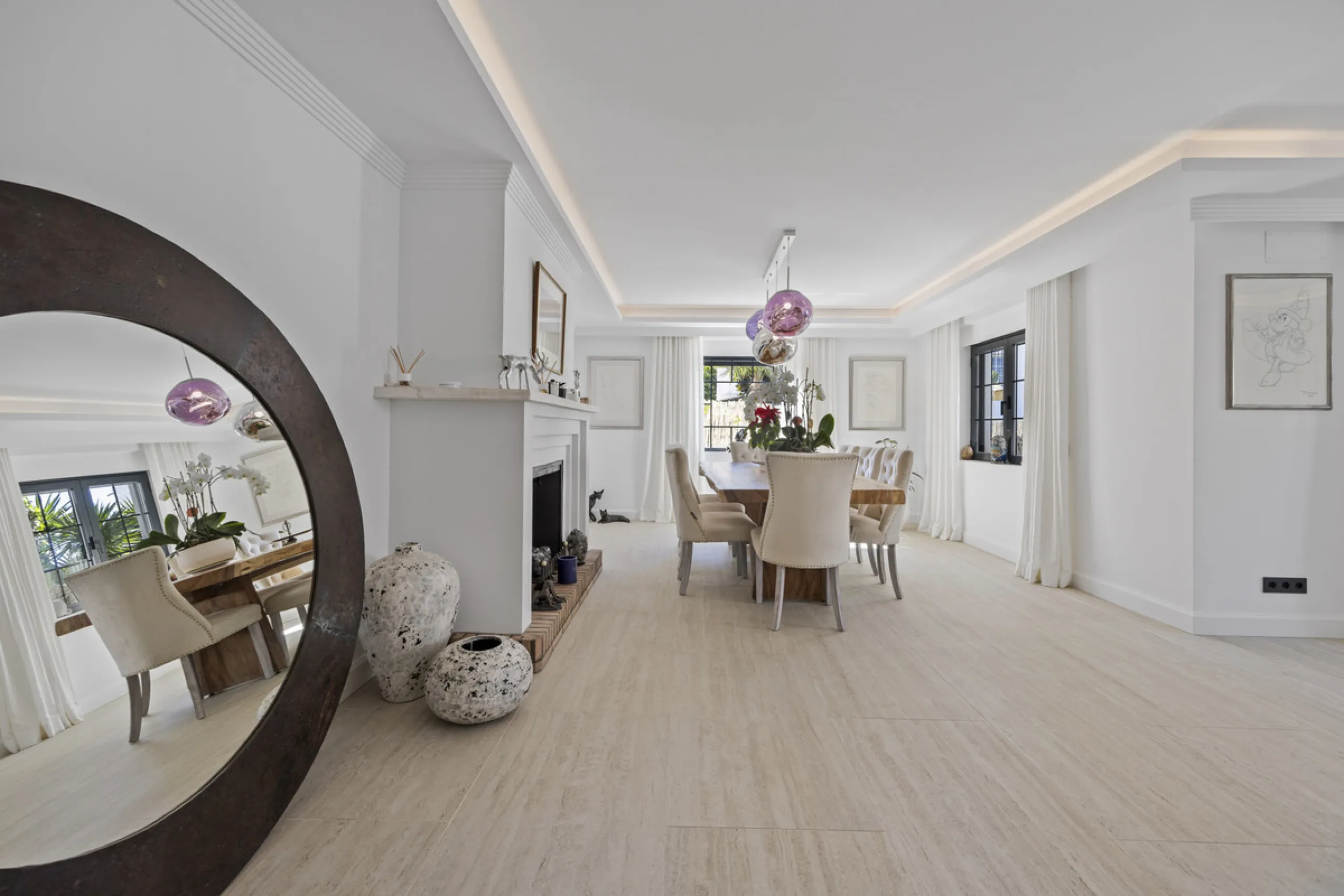 Discover this exceptional southwest-facing villa, a stunning blend of contemporary elegance and modern comfort. Recently refurbished with top-quality materials, this exquisite home boasts a sleek design that perfectly complements its surroundings. Located