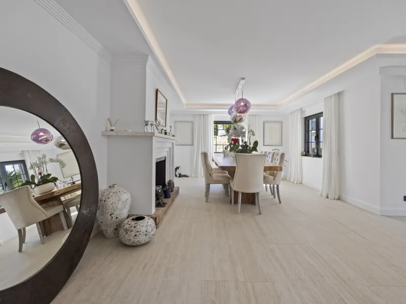 Discover this exceptional southwest-facing villa, a stunning blend of contemporary elegance and modern comfort. Recently refurbished with top-quality materials, this exquisite home boasts a sleek design that perfectly complements its surroundings. Located