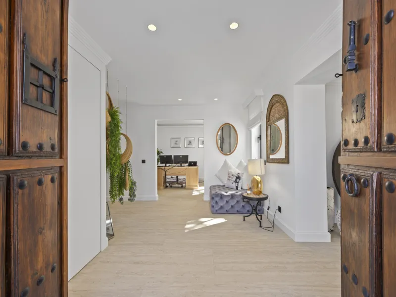 Discover this exceptional southwest-facing villa, a stunning blend of contemporary elegance and modern comfort. Recently refurbished with top-quality materials, this exquisite home boasts a sleek design that perfectly complements its surroundings. Located