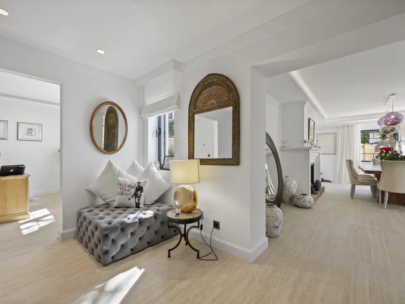 Discover this exceptional southwest-facing villa, a stunning blend of contemporary elegance and modern comfort. Recently refurbished with top-quality materials, this exquisite home boasts a sleek design that perfectly complements its surroundings. Located