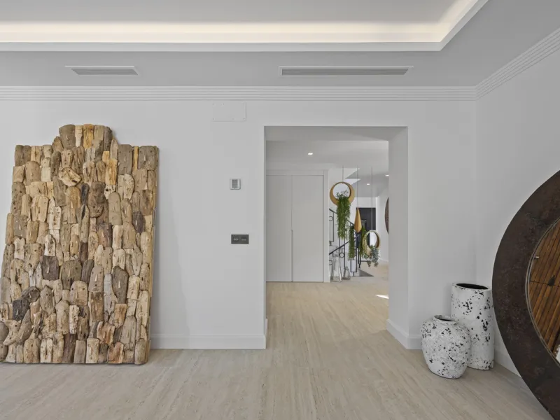 Discover this exceptional southwest-facing villa, a stunning blend of contemporary elegance and modern comfort. Recently refurbished with top-quality materials, this exquisite home boasts a sleek design that perfectly complements its surroundings. Located