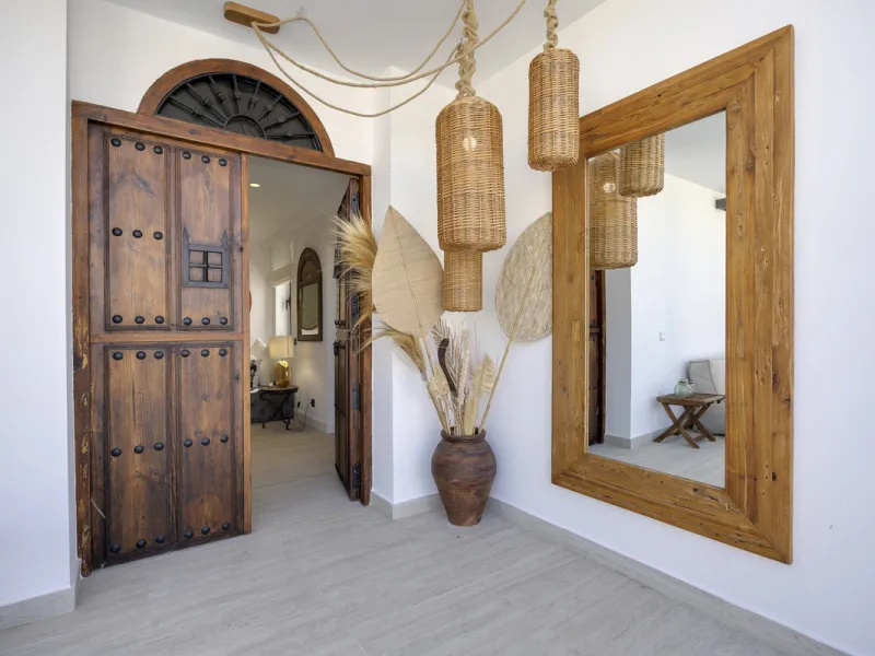 Discover this exceptional southwest-facing villa, a stunning blend of contemporary elegance and modern comfort. Recently refurbished with top-quality materials, this exquisite home boasts a sleek design that perfectly complements its surroundings. Located