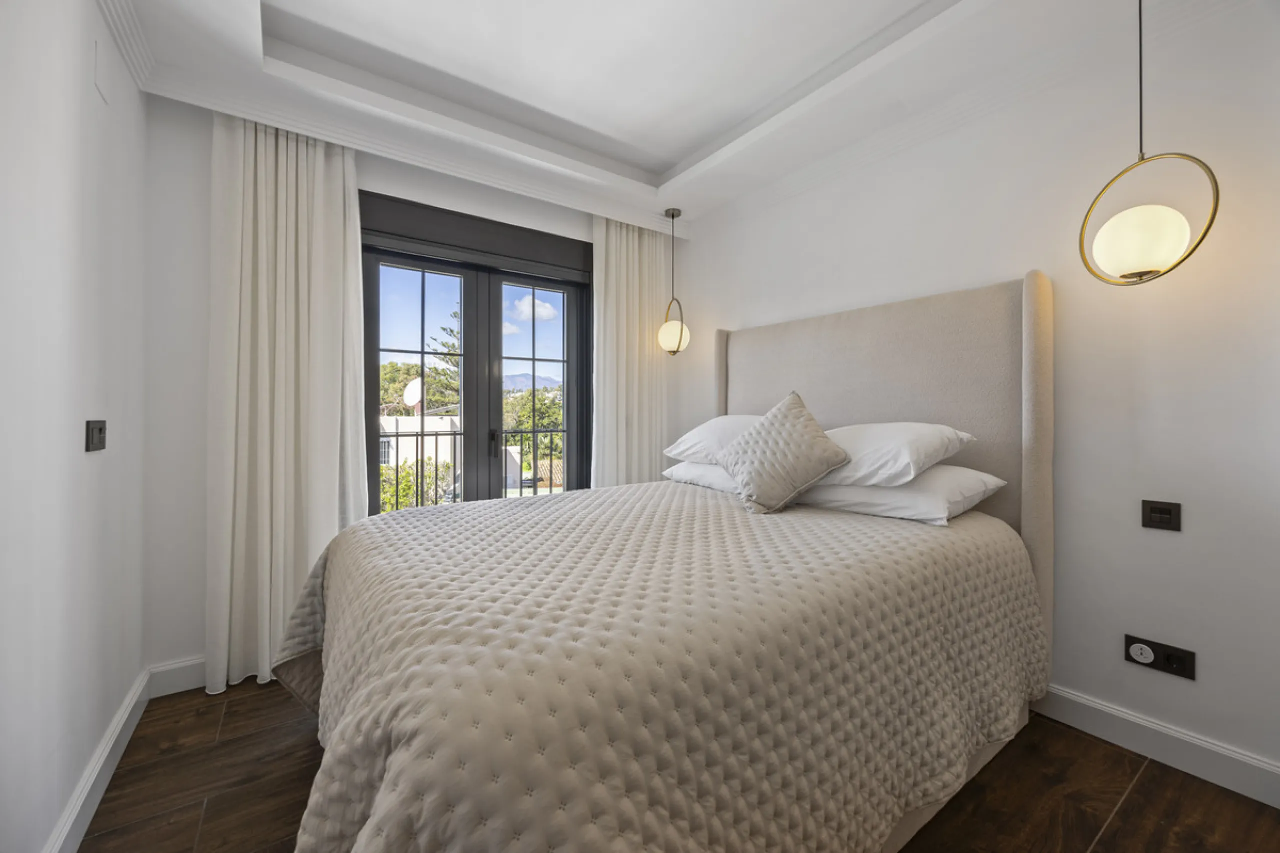 Discover this exceptional southwest-facing villa, a stunning blend of contemporary elegance and modern comfort. Recently refurbished with top-quality materials, this exquisite home boasts a sleek design that perfectly complements its surroundings. Located