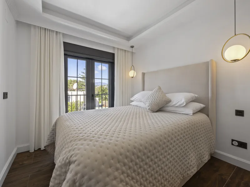 Discover this exceptional southwest-facing villa, a stunning blend of contemporary elegance and modern comfort. Recently refurbished with top-quality materials, this exquisite home boasts a sleek design that perfectly complements its surroundings. Located