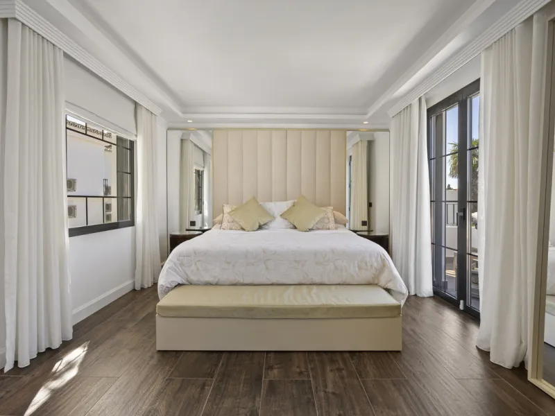 Discover this exceptional southwest-facing villa, a stunning blend of contemporary elegance and modern comfort. Recently refurbished with top-quality materials, this exquisite home boasts a sleek design that perfectly complements its surroundings. Located