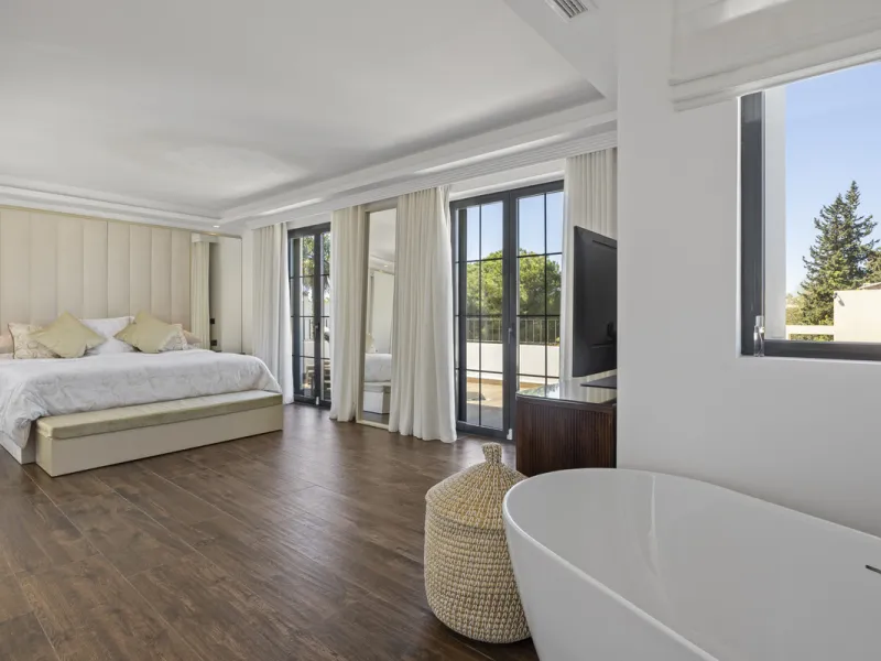 Discover this exceptional southwest-facing villa, a stunning blend of contemporary elegance and modern comfort. Recently refurbished with top-quality materials, this exquisite home boasts a sleek design that perfectly complements its surroundings. Located