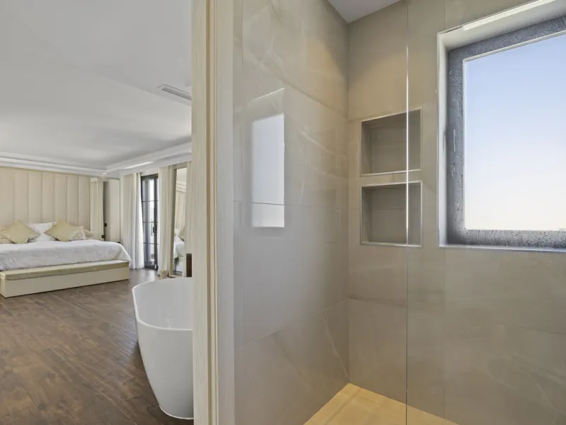 Discover this exceptional southwest-facing villa, a stunning blend of contemporary elegance and modern comfort. Recently refurbished with top-quality materials, this exquisite home boasts a sleek design that perfectly complements its surroundings. Located