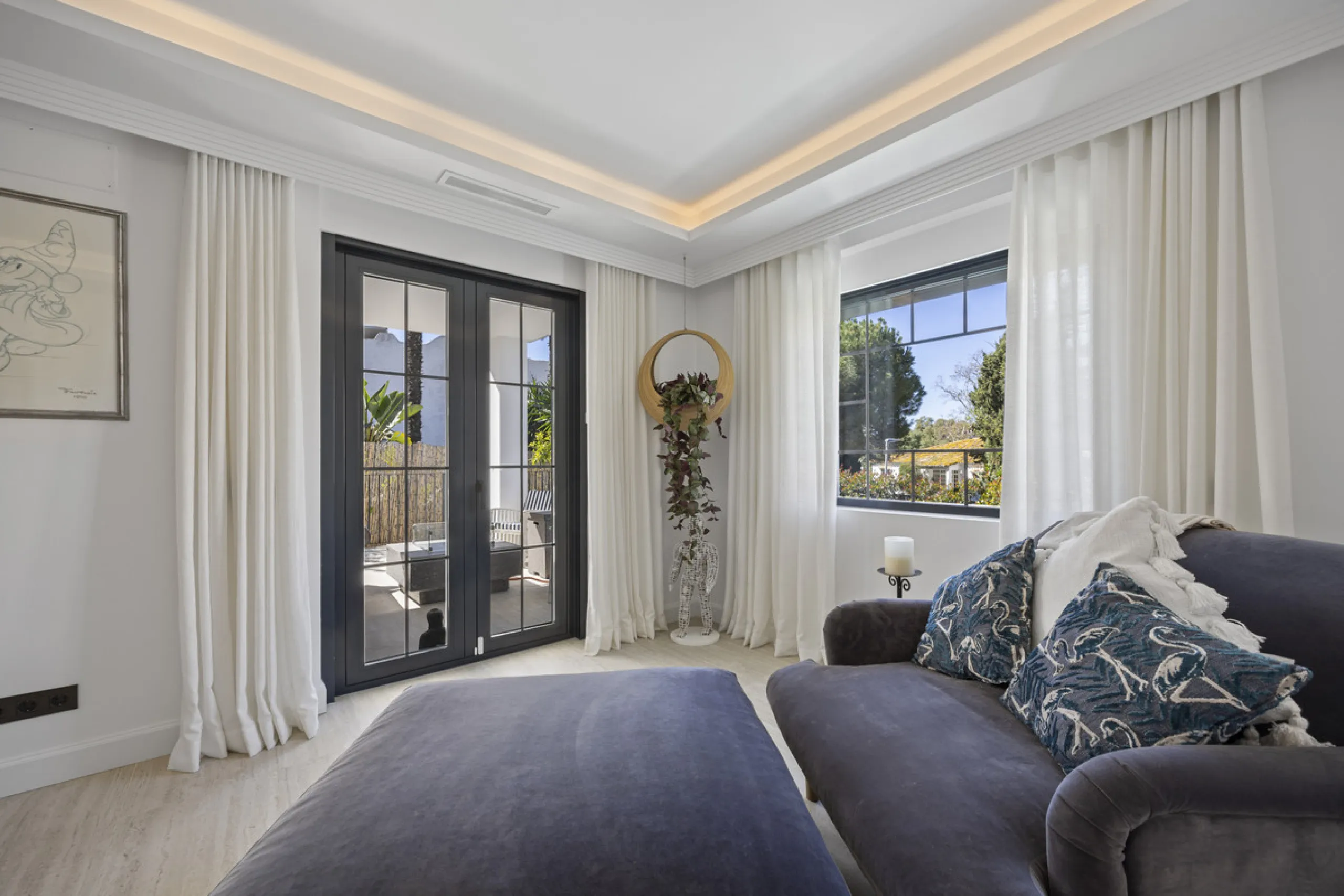 Discover this exceptional southwest-facing villa, a stunning blend of contemporary elegance and modern comfort. Recently refurbished with top-quality materials, this exquisite home boasts a sleek design that perfectly complements its surroundings. Located