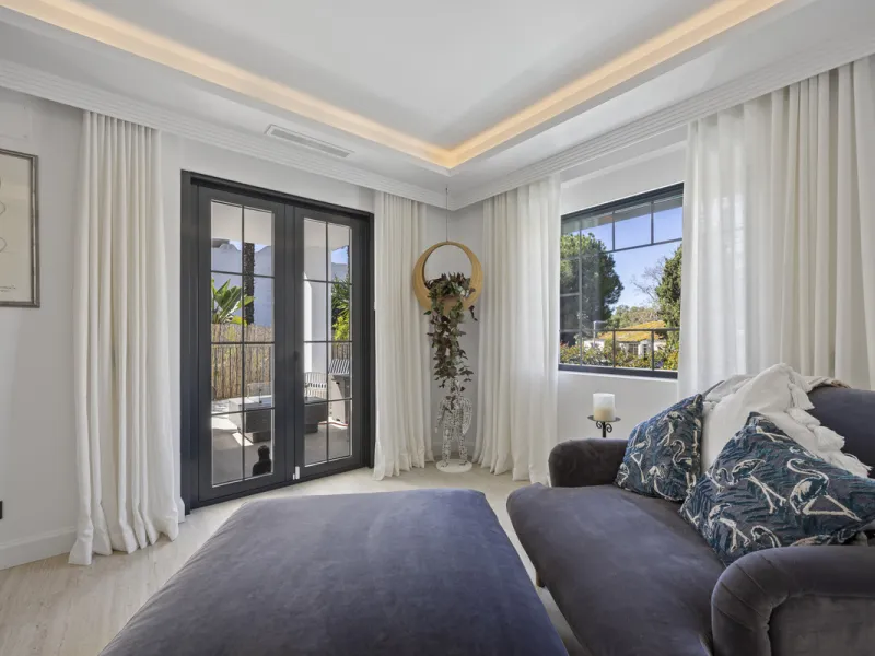 Discover this exceptional southwest-facing villa, a stunning blend of contemporary elegance and modern comfort. Recently refurbished with top-quality materials, this exquisite home boasts a sleek design that perfectly complements its surroundings. Located