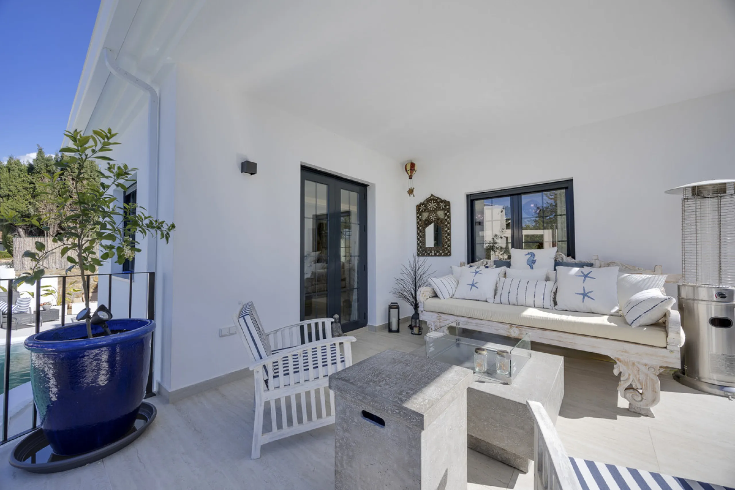 Discover this exceptional southwest-facing villa, a stunning blend of contemporary elegance and modern comfort. Recently refurbished with top-quality materials, this exquisite home boasts a sleek design that perfectly complements its surroundings. Located