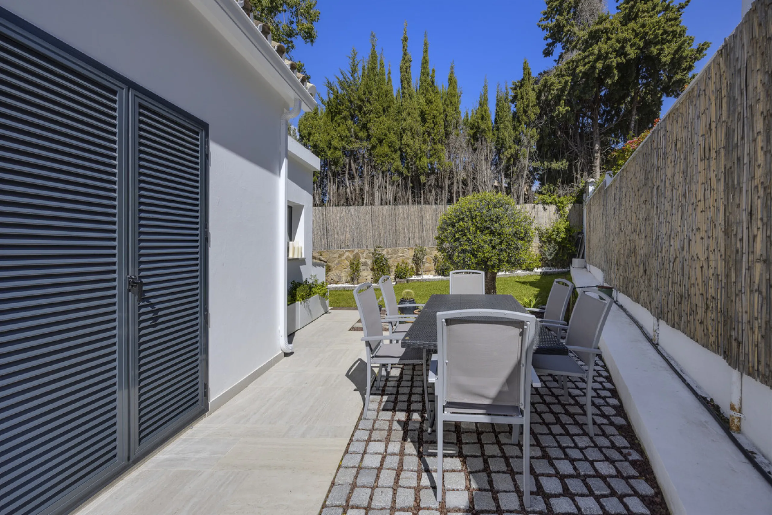 Discover this exceptional southwest-facing villa, a stunning blend of contemporary elegance and modern comfort. Recently refurbished with top-quality materials, this exquisite home boasts a sleek design that perfectly complements its surroundings. Located