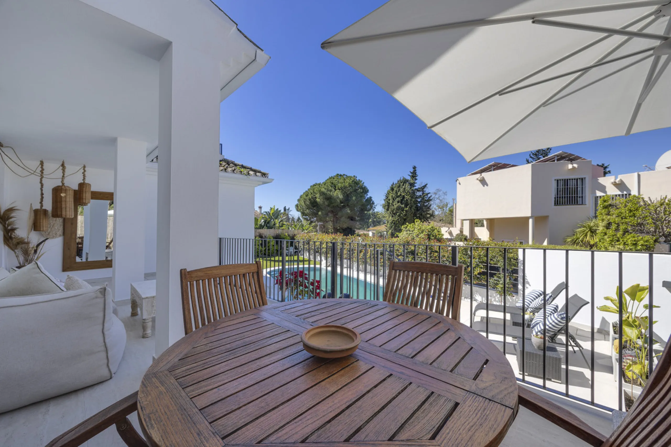Discover this exceptional southwest-facing villa, a stunning blend of contemporary elegance and modern comfort. Recently refurbished with top-quality materials, this exquisite home boasts a sleek design that perfectly complements its surroundings. Located