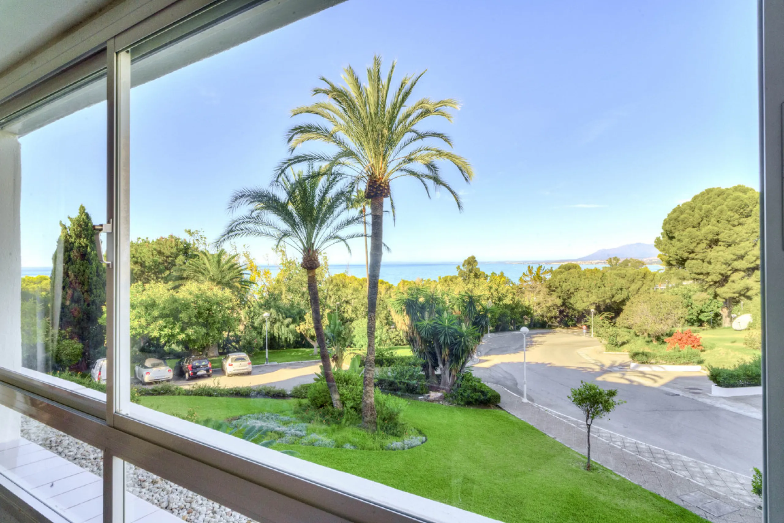 Located in the sought-after Torre Real urbanization, within the distinguished Atenea II building, this refined first-floor apartment offers a serene and comfortable lifestyle just minutes from the heart of Marbella.