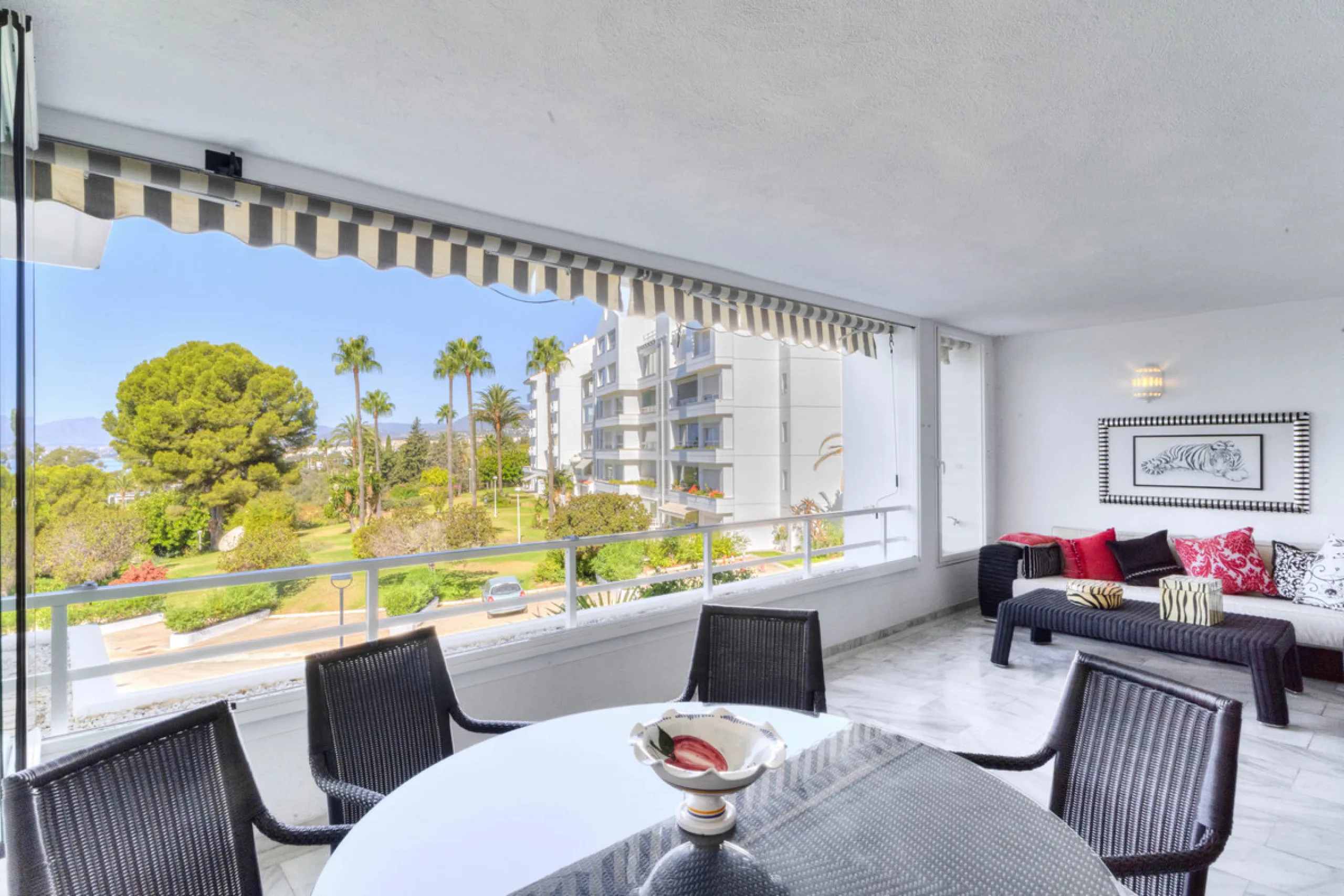 Located in the sought-after Torre Real urbanization, within the distinguished Atenea II building, this refined first-floor apartment offers a serene and comfortable lifestyle just minutes from the heart of Marbella.