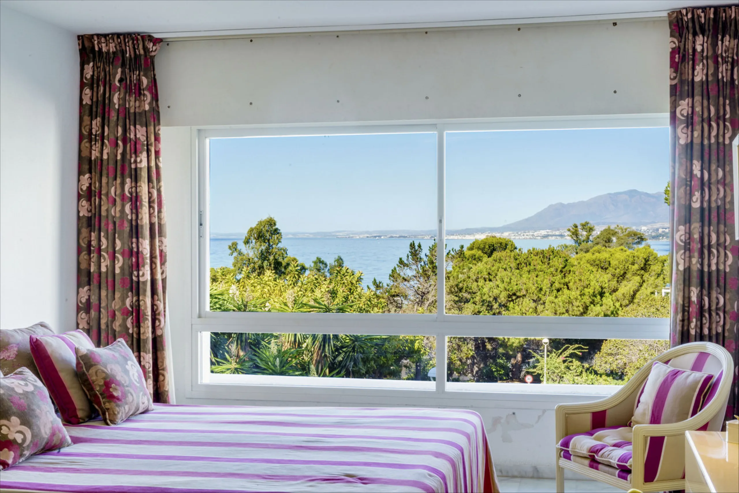 Located in the sought-after Torre Real urbanization, within the distinguished Atenea II building, this refined first-floor apartment offers a serene and comfortable lifestyle just minutes from the heart of Marbella.