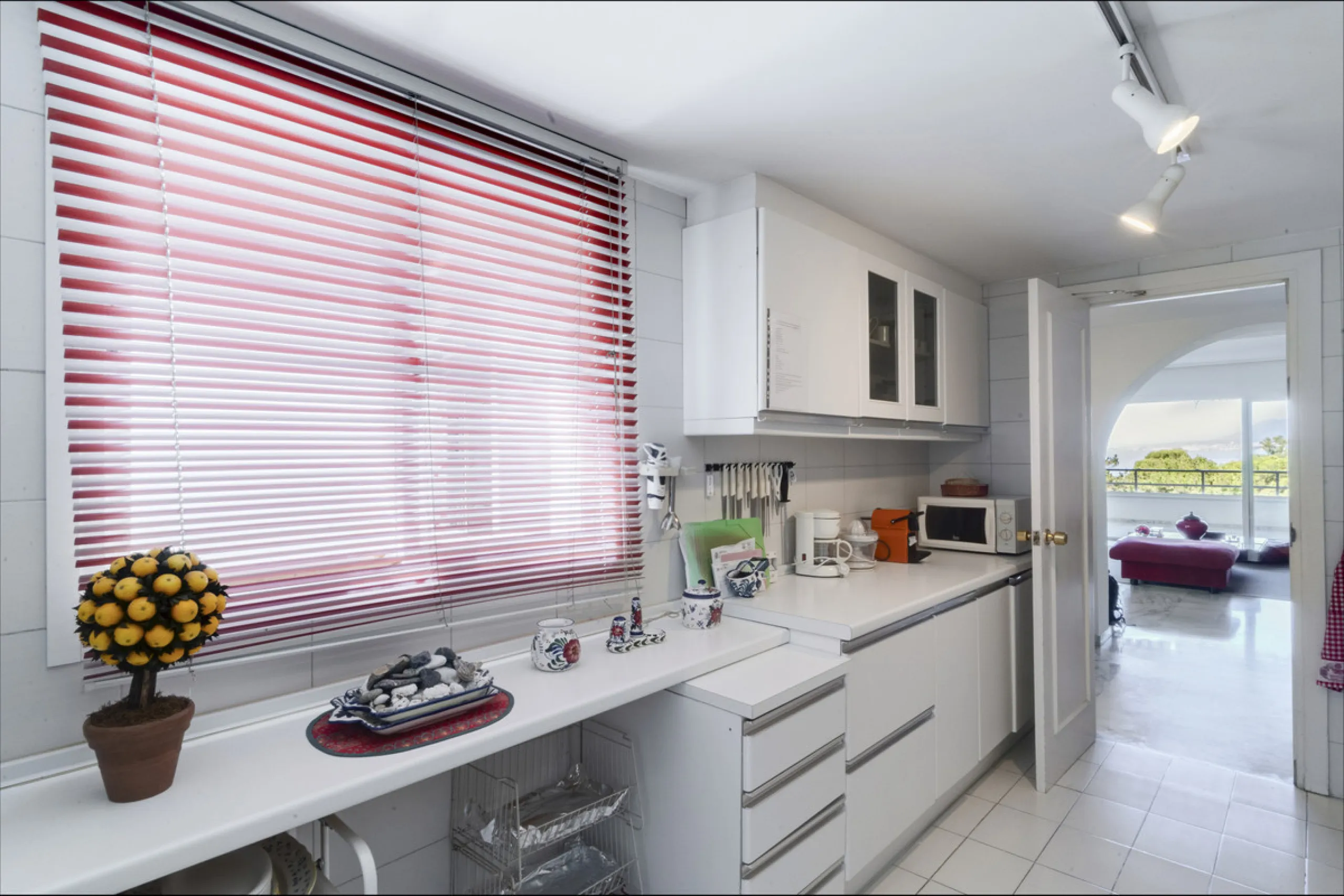 Located in the sought-after Torre Real urbanization, within the distinguished Atenea II building, this refined first-floor apartment offers a serene and comfortable lifestyle just minutes from the heart of Marbella.