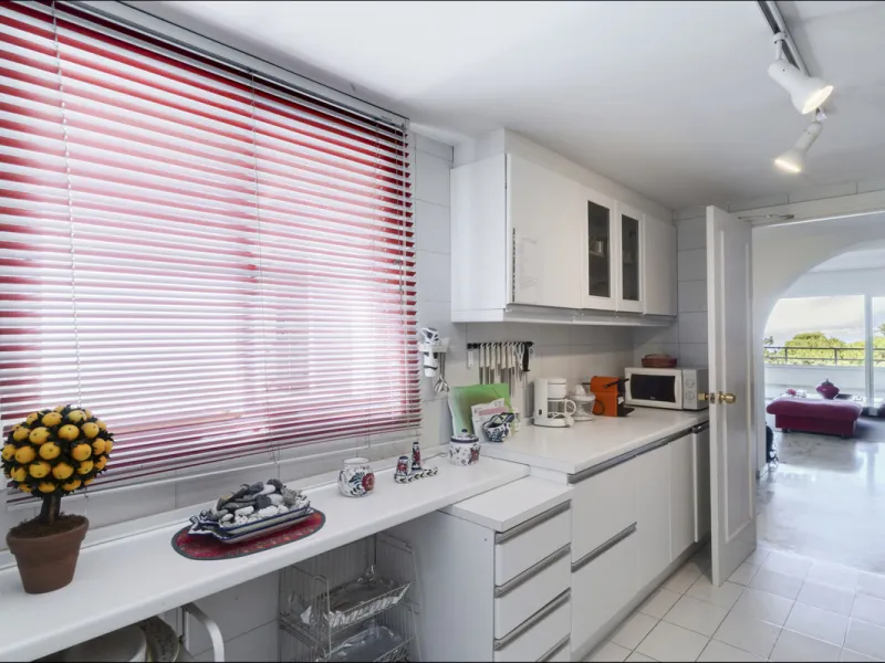 Located in the sought-after Torre Real urbanization, within the distinguished Atenea II building, this refined first-floor apartment offers a serene and comfortable lifestyle just minutes from the heart of Marbella.
