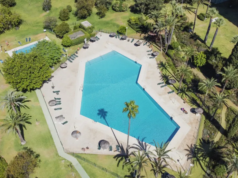 Located in the sought-after Torre Real urbanization, within the distinguished Atenea II building, this refined first-floor apartment offers a serene and comfortable lifestyle just minutes from the heart of Marbella.