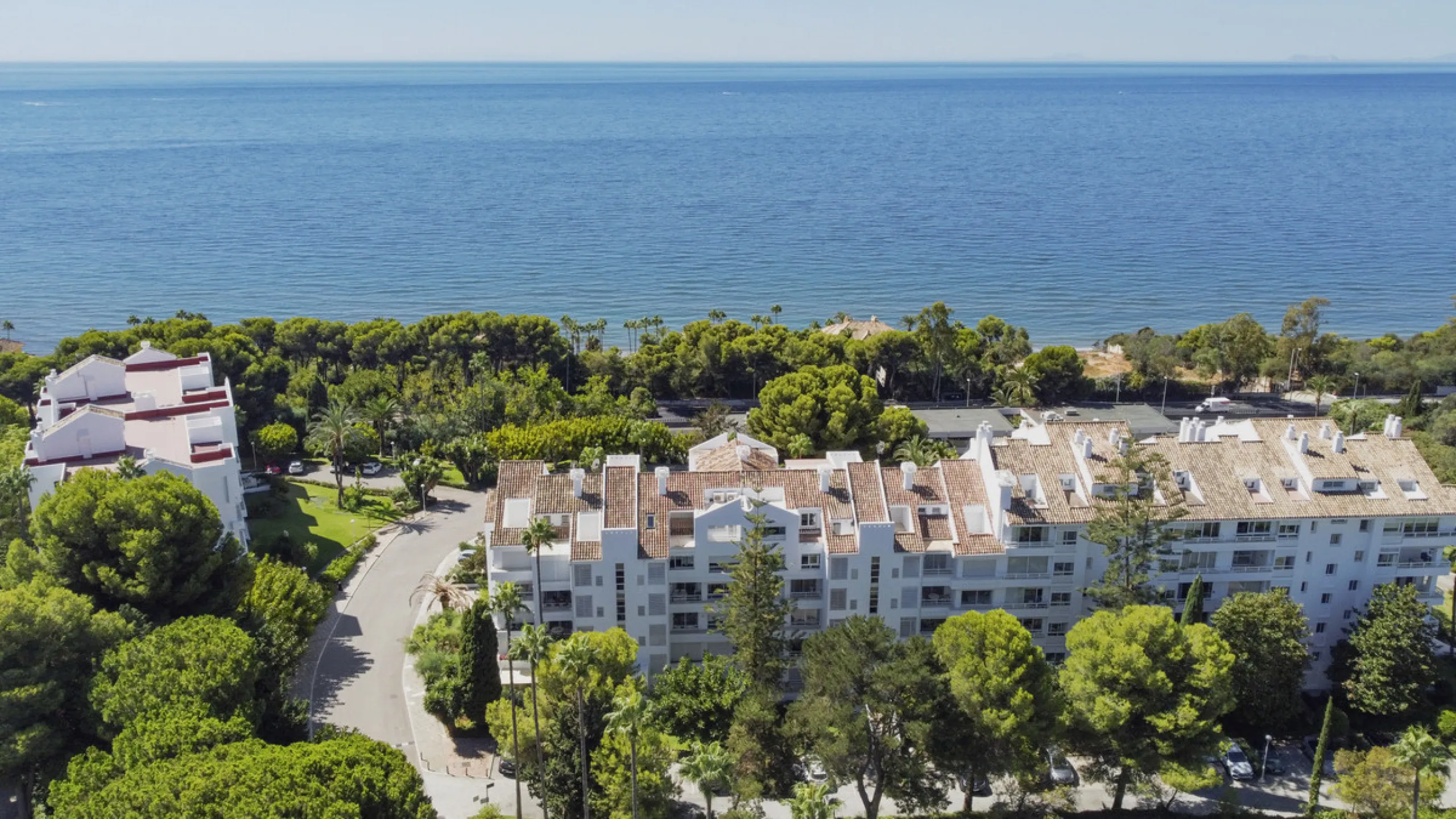 Located in the sought-after Torre Real urbanization, within the distinguished Atenea II building, this refined first-floor apartment offers a serene and comfortable lifestyle just minutes from the heart of Marbella.