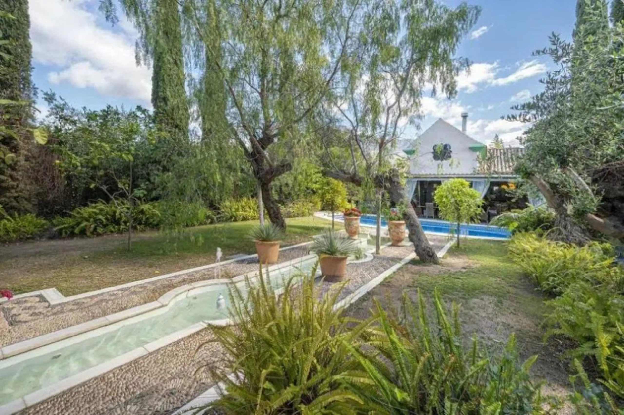 Welcome to a one-of-a-kind Mediterranean sanctuary, nestled in the exclusive urbanization of Lomas de Marbella Club, a place where timeless Andalusian charm meets artistic soul and untapped potential.