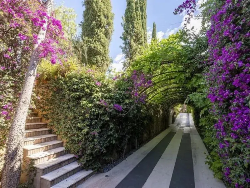 Welcome to a one-of-a-kind Mediterranean sanctuary, nestled in the exclusive urbanization of Lomas de Marbella Club, a place where timeless Andalusian charm meets artistic soul and untapped potential.