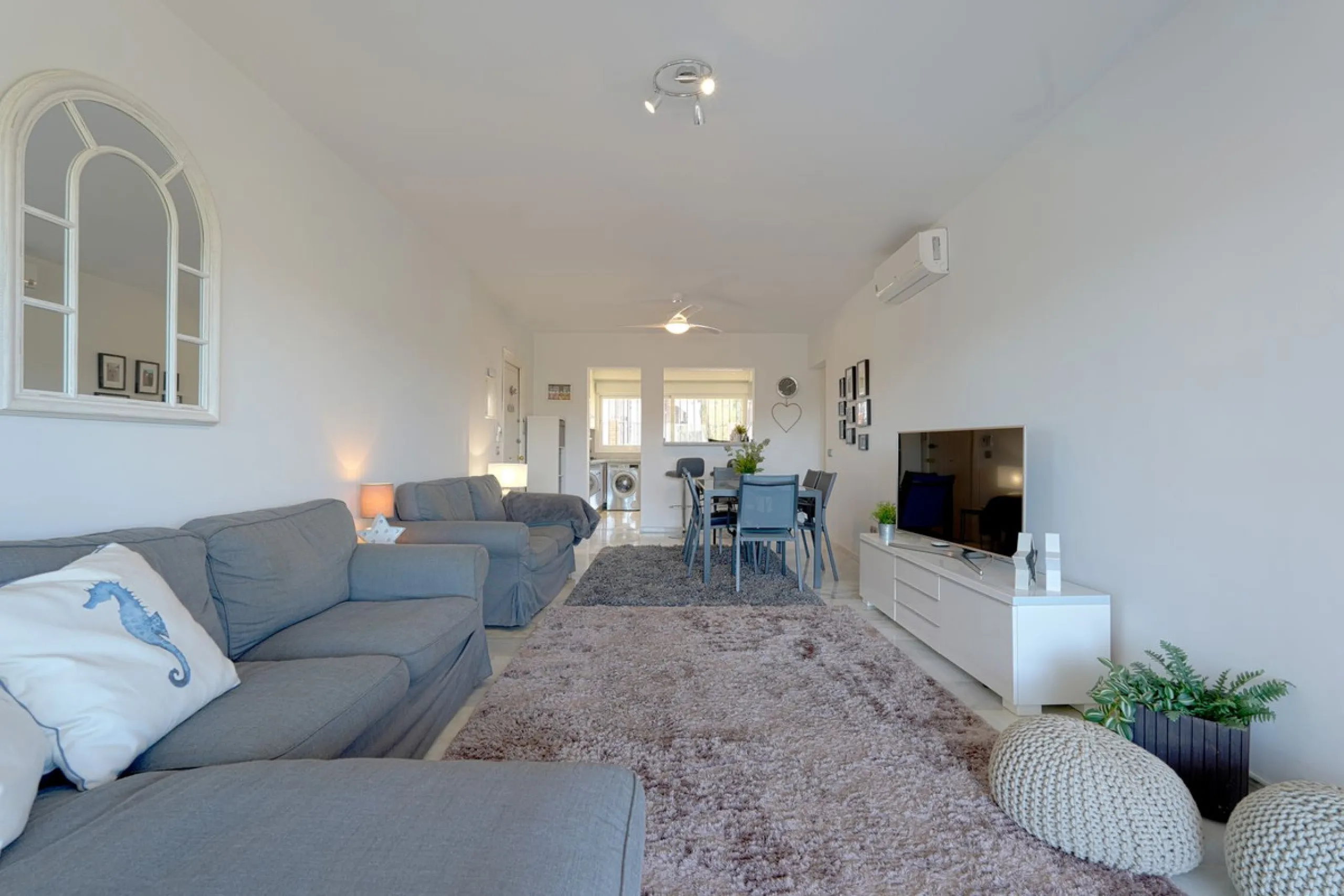 This beautifully fully renovated ground-floor corner apartment enjoys truly exceptional panoramic views across El Paraíso Golf, with two lakes in the foreground and sweeping fairways stretching into the distance — a view that feels open, green and incredi
