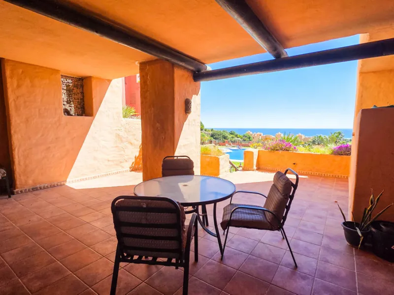 Set within a well-maintained residential community in La Duquesa, this ground floor apartment with sea views and a huge private terrace offers the perfect blend of indoor comfort and outdoor living. With the beach, marina, restaurants, and local amenities