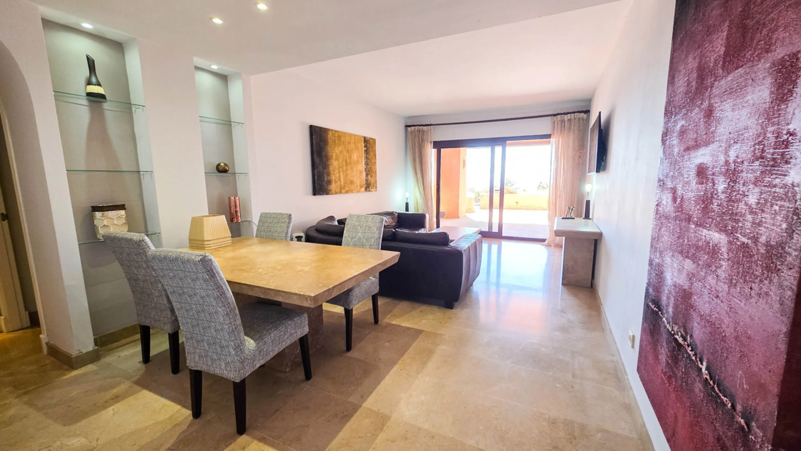Set within a well-maintained residential community in La Duquesa, this ground floor apartment with sea views and a huge private terrace offers the perfect blend of indoor comfort and outdoor living. With the beach, marina, restaurants, and local amenities