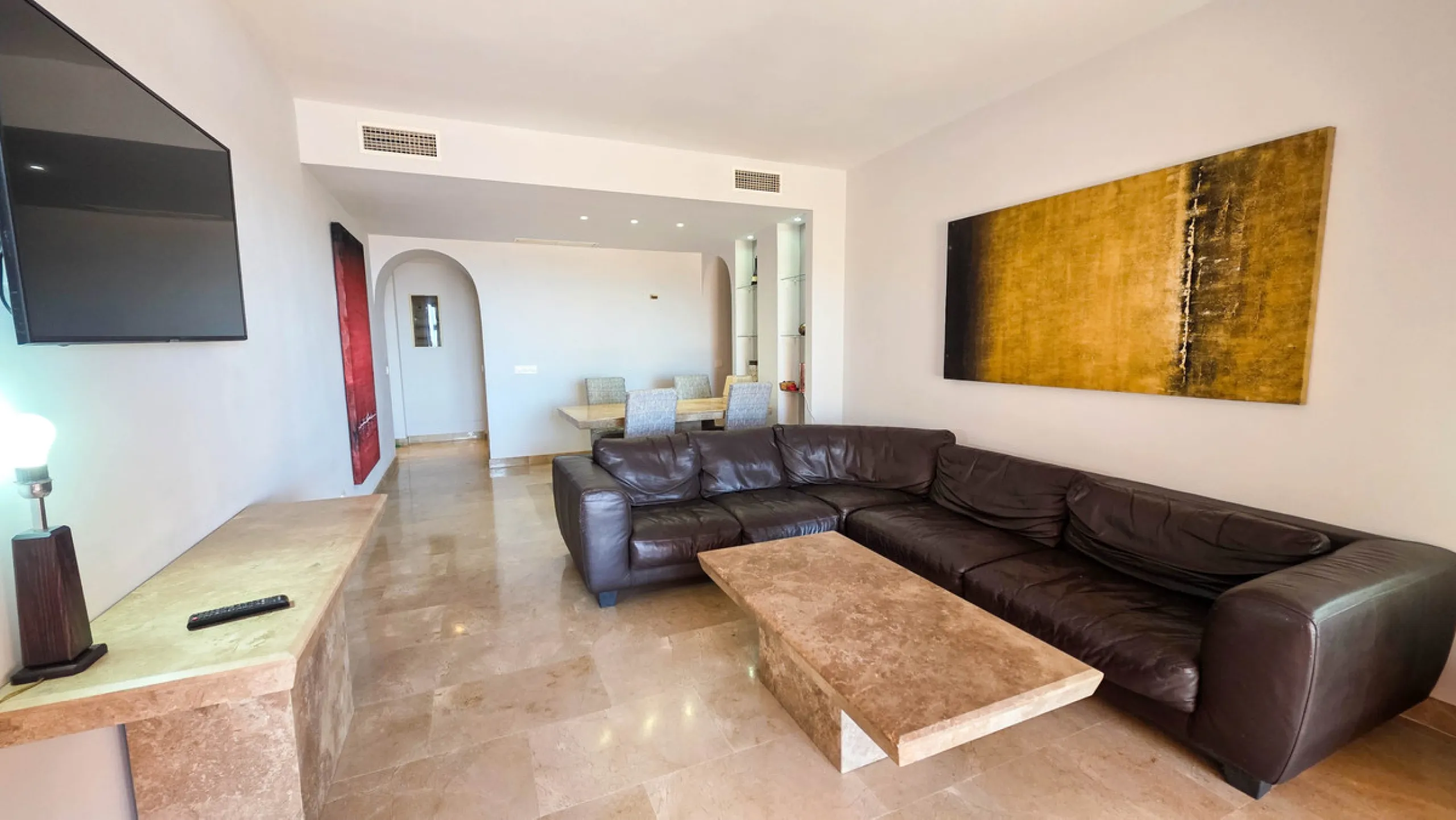 Set within a well-maintained residential community in La Duquesa, this ground floor apartment with sea views and a huge private terrace offers the perfect blend of indoor comfort and outdoor living. With the beach, marina, restaurants, and local amenities