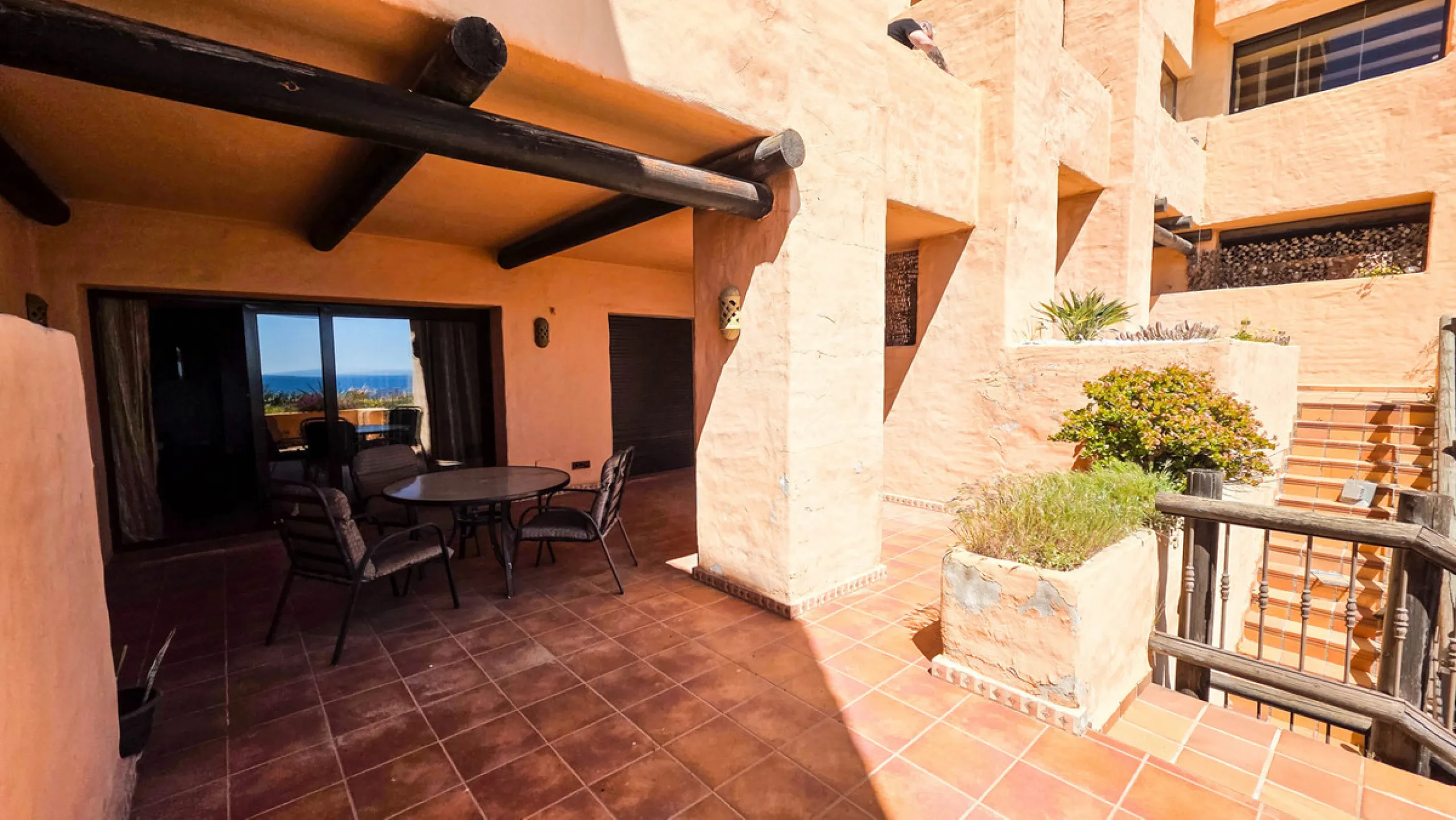Set within a well-maintained residential community in La Duquesa, this ground floor apartment with sea views and a huge private terrace offers the perfect blend of indoor comfort and outdoor living. With the beach, marina, restaurants, and local amenities