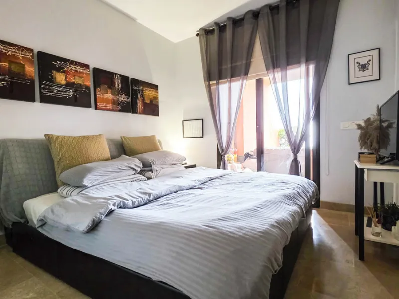 Set within a well-maintained residential community in La Duquesa, this ground floor apartment with sea views and a huge private terrace offers the perfect blend of indoor comfort and outdoor living. With the beach, marina, restaurants, and local amenities
