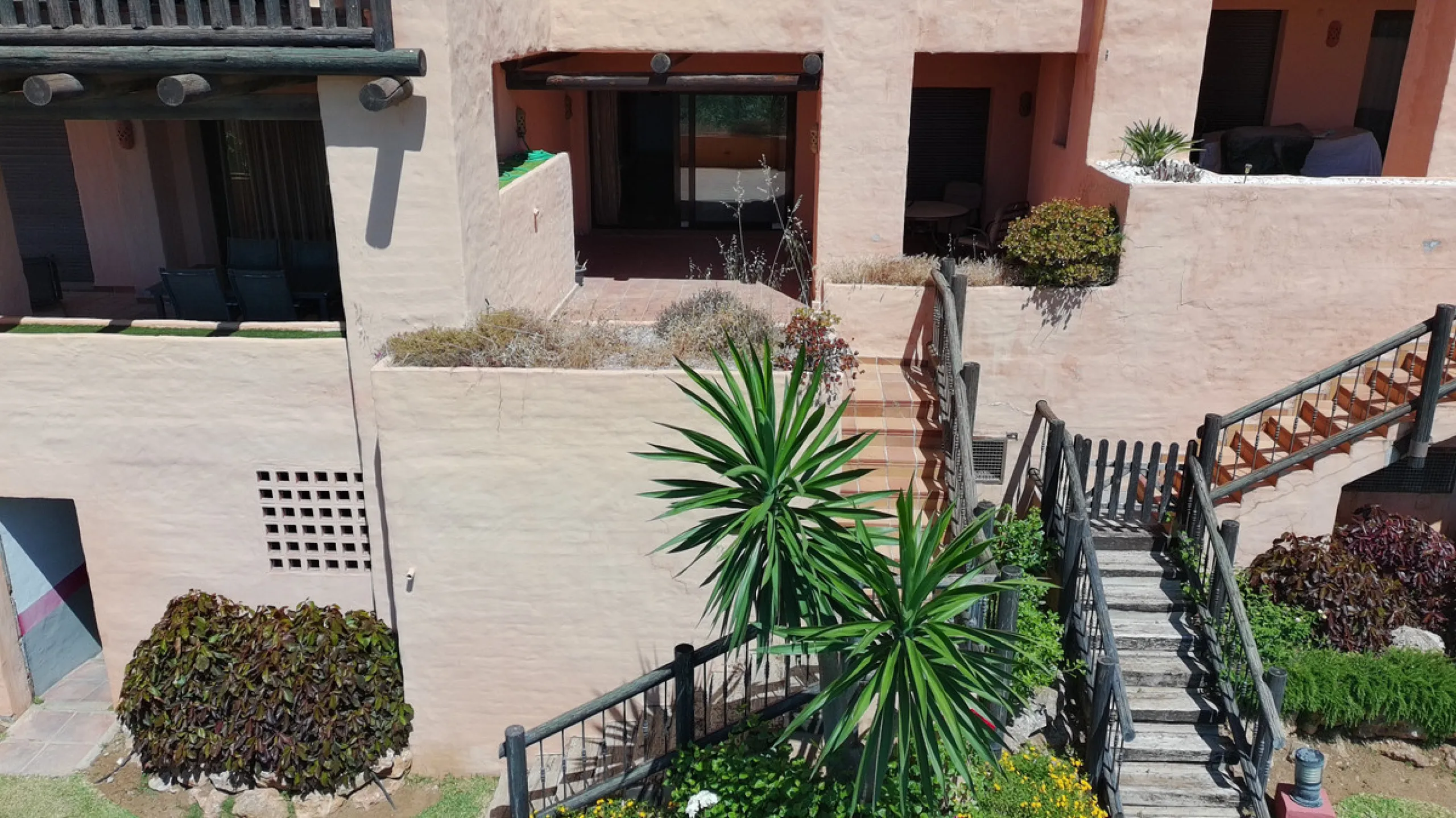 Set within a well-maintained residential community in La Duquesa, this ground floor apartment with sea views and a huge private terrace offers the perfect blend of indoor comfort and outdoor living. With the beach, marina, restaurants, and local amenities