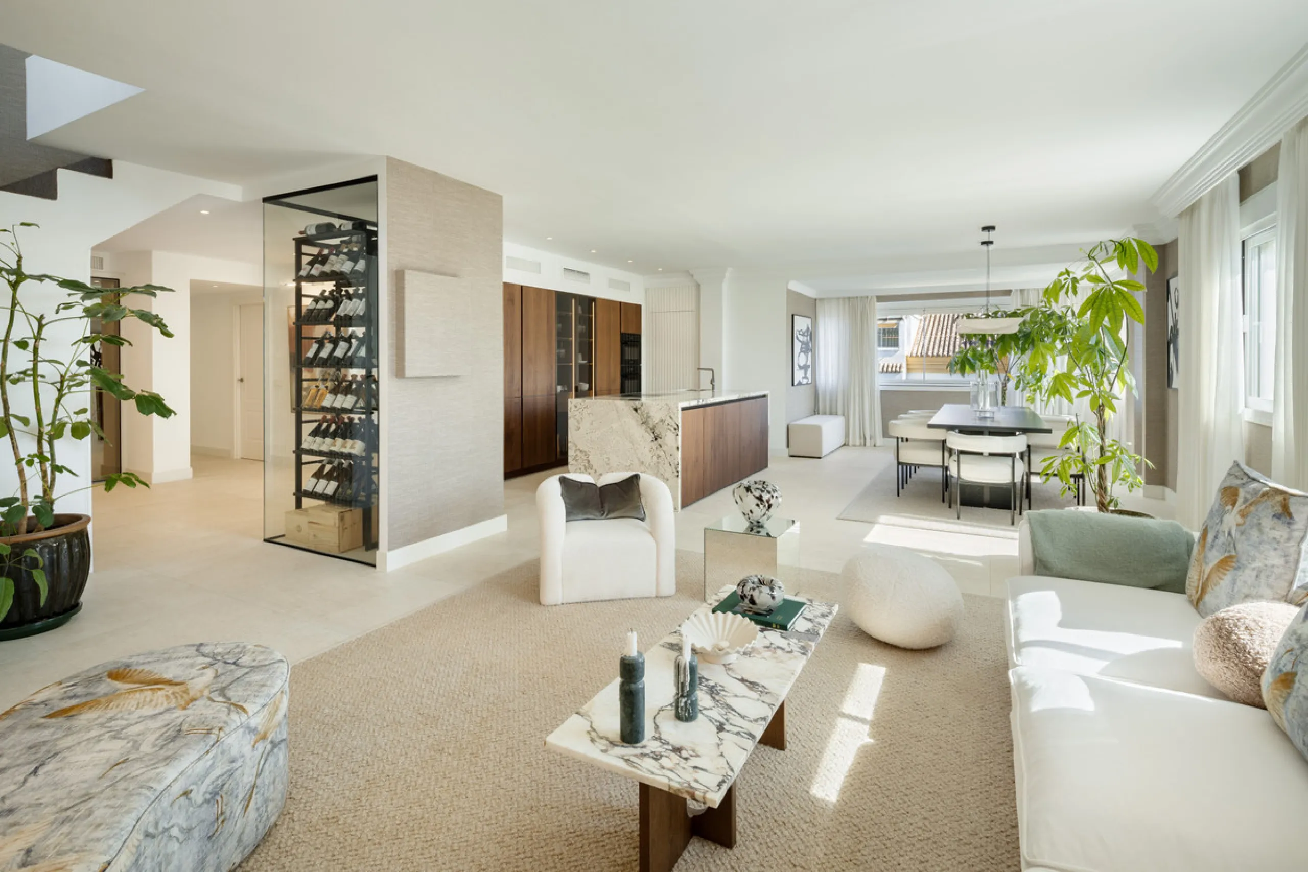 Located in the sought-after area of the Marbella Golden Mile, Costa PH is an exceptional duplex penthouse offering panoramic sea and mountain views. Designed with a modern open-plan layout, the living, dining, and kitchen areas are seamlessly connected, c