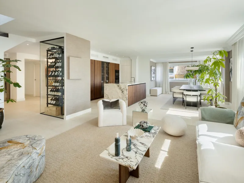Located in the sought-after area of the Marbella Golden Mile, Costa PH is an exceptional duplex penthouse offering panoramic sea and mountain views. Designed with a modern open-plan layout, the living, dining, and kitchen areas are seamlessly connected, c
