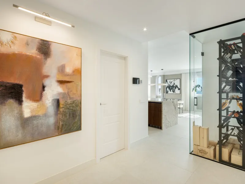 Located in the sought-after area of the Marbella Golden Mile, Costa PH is an exceptional duplex penthouse offering panoramic sea and mountain views. Designed with a modern open-plan layout, the living, dining, and kitchen areas are seamlessly connected, c