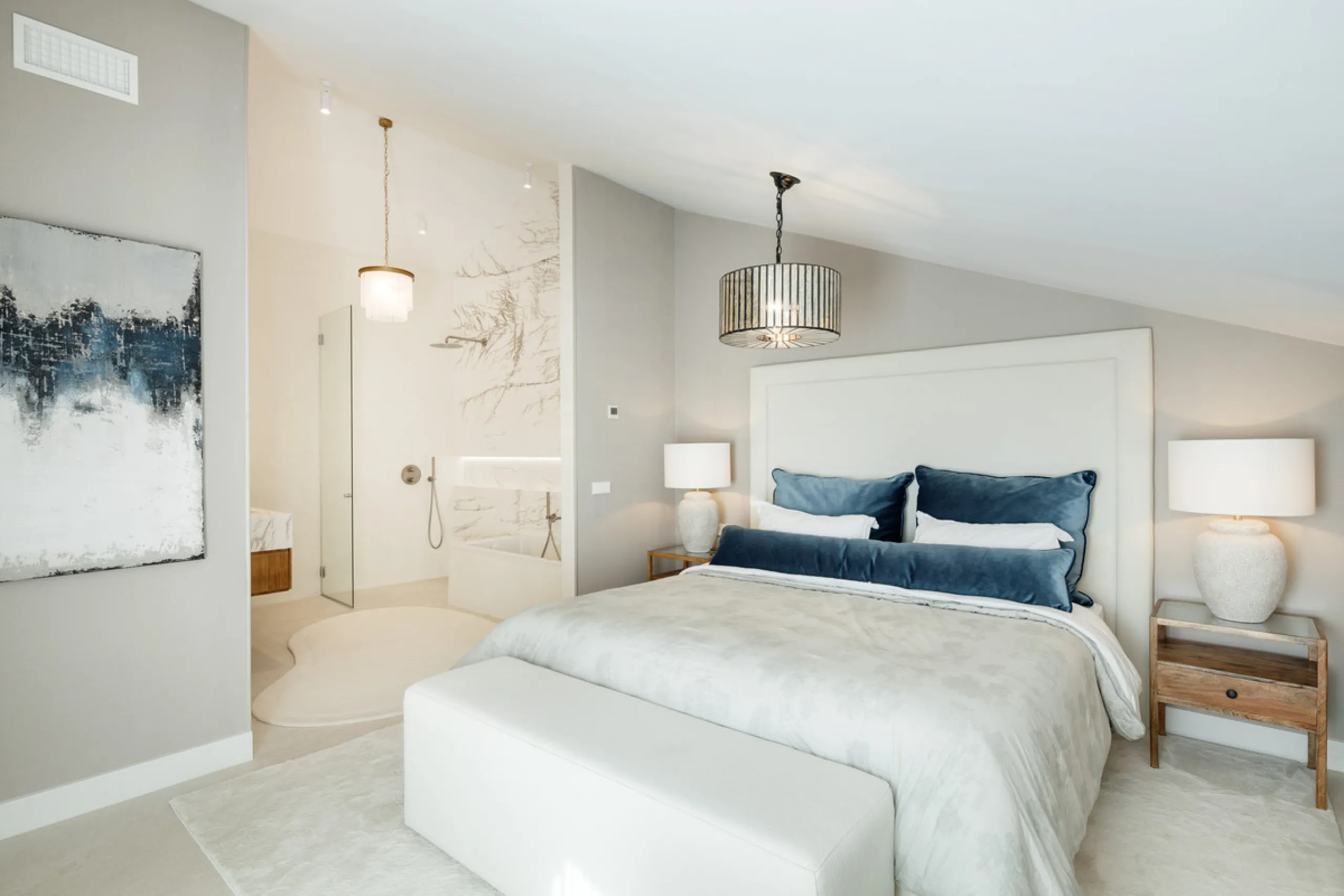 Located in the sought-after area of the Marbella Golden Mile, Costa PH is an exceptional duplex penthouse offering panoramic sea and mountain views. Designed with a modern open-plan layout, the living, dining, and kitchen areas are seamlessly connected, c