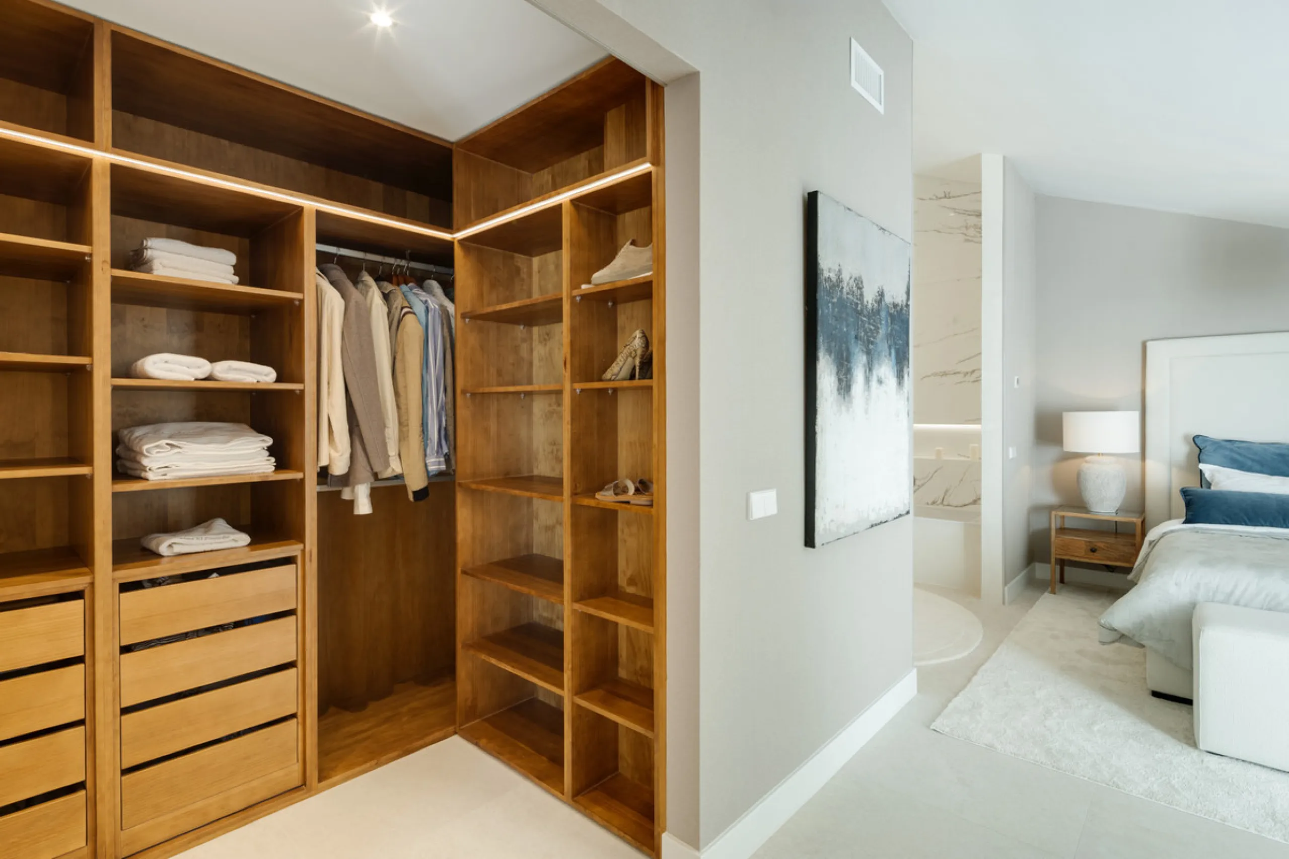 Located in the sought-after area of the Marbella Golden Mile, Costa PH is an exceptional duplex penthouse offering panoramic sea and mountain views. Designed with a modern open-plan layout, the living, dining, and kitchen areas are seamlessly connected, c