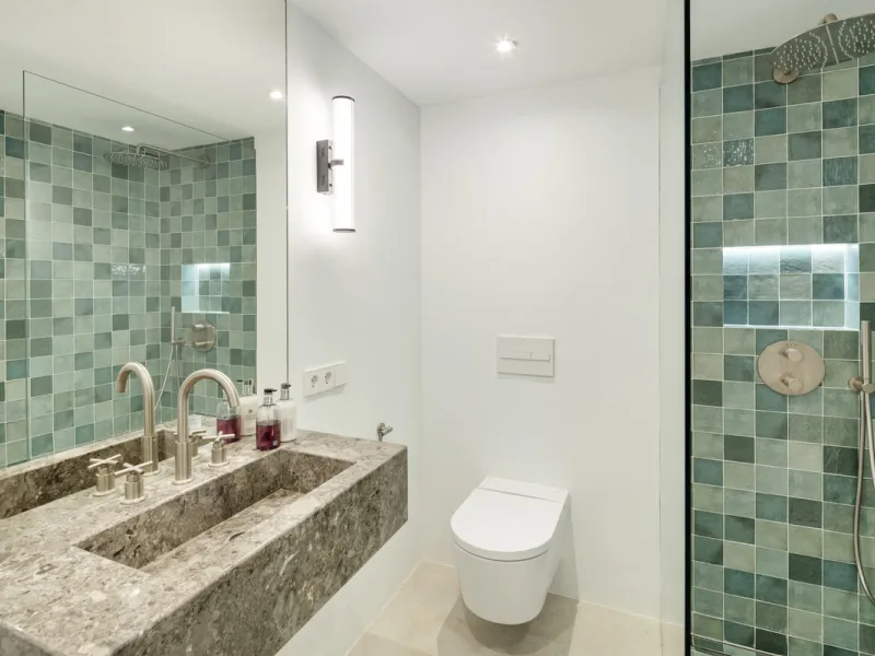 Located in the sought-after area of the Marbella Golden Mile, Costa PH is an exceptional duplex penthouse offering panoramic sea and mountain views. Designed with a modern open-plan layout, the living, dining, and kitchen areas are seamlessly connected, c