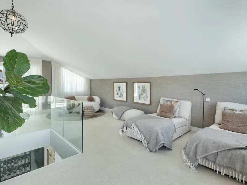 Located in the sought-after area of the Marbella Golden Mile, Costa PH is an exceptional duplex penthouse offering panoramic sea and mountain views. Designed with a modern open-plan layout, the living, dining, and kitchen areas are seamlessly connected, c