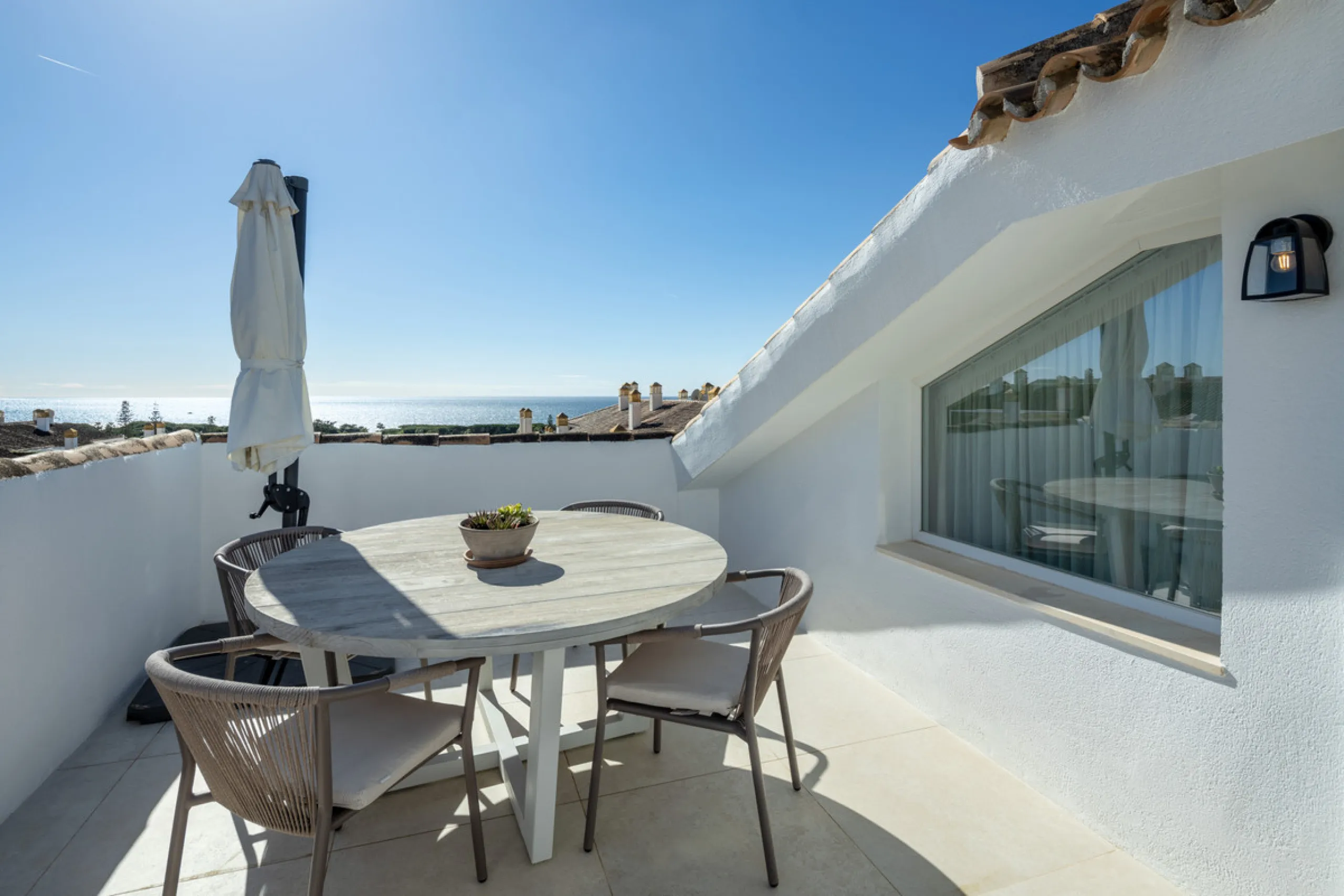 Located in the sought-after area of the Marbella Golden Mile, Costa PH is an exceptional duplex penthouse offering panoramic sea and mountain views. Designed with a modern open-plan layout, the living, dining, and kitchen areas are seamlessly connected, c